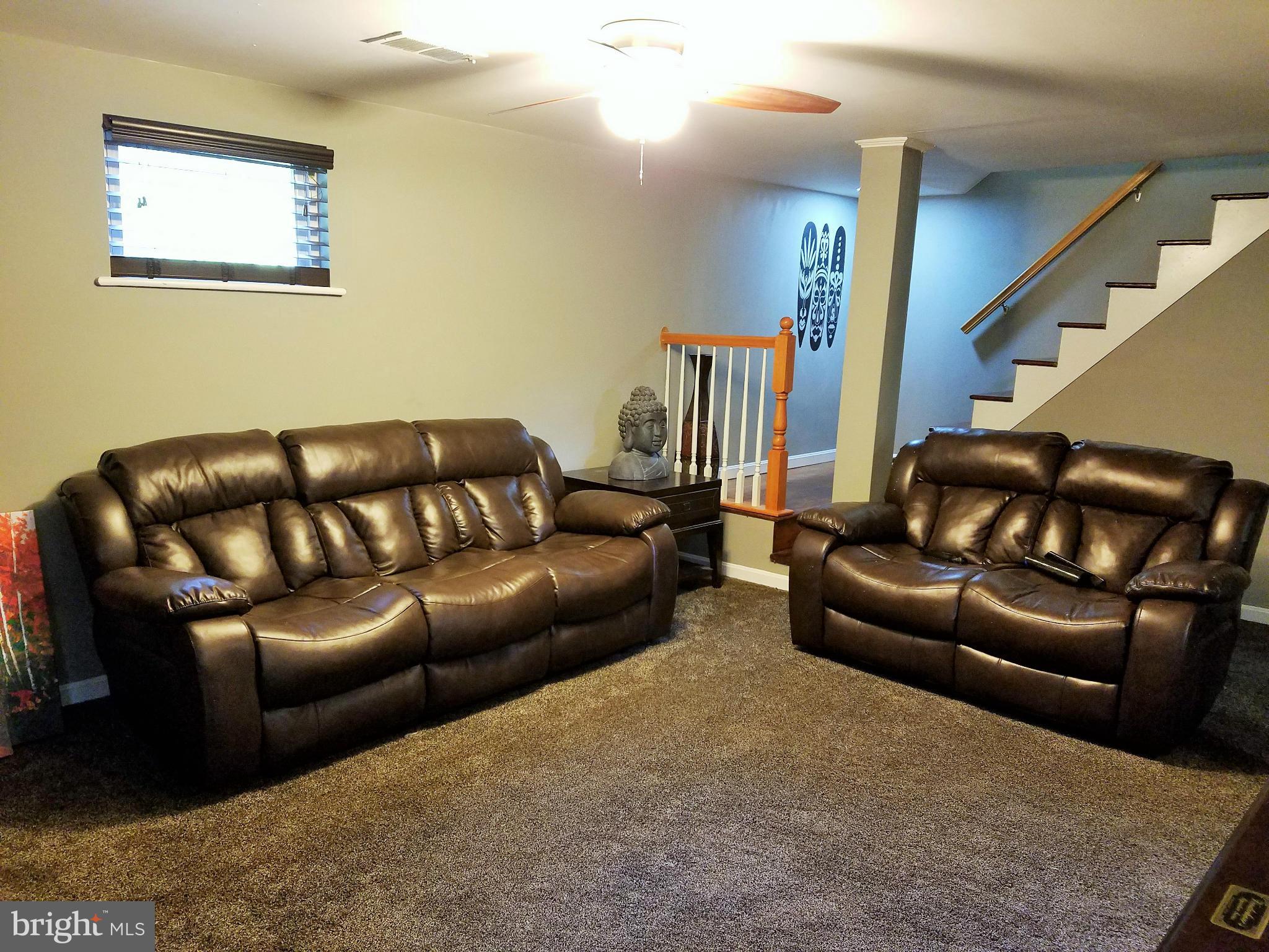 8506 Schultz Road Clinton, MD 20735 - Photo 18 of 30 a living room with furniture