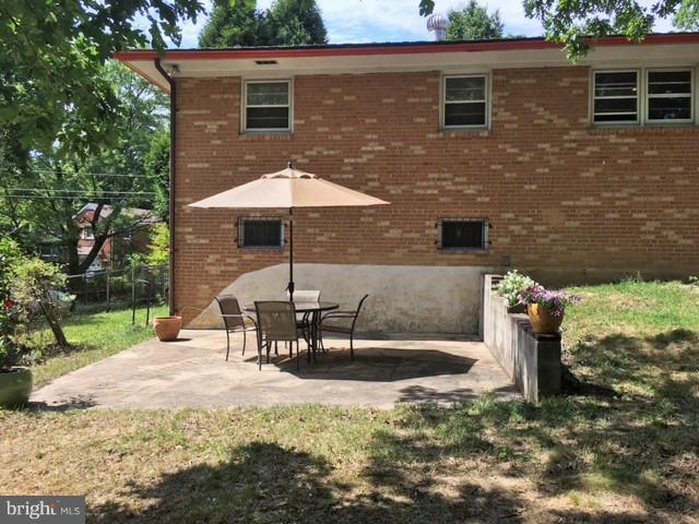 8506 Schultz Road Clinton, MD 20735 - Photo 30 of 30 a view of a backyard with sitting area and furniture