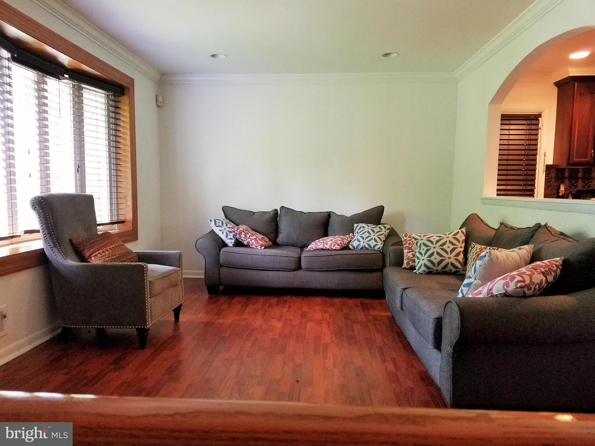 8506 Schultz Road Clinton, MD 20735 - Photo 4 of 30 a living room with furniture and a window