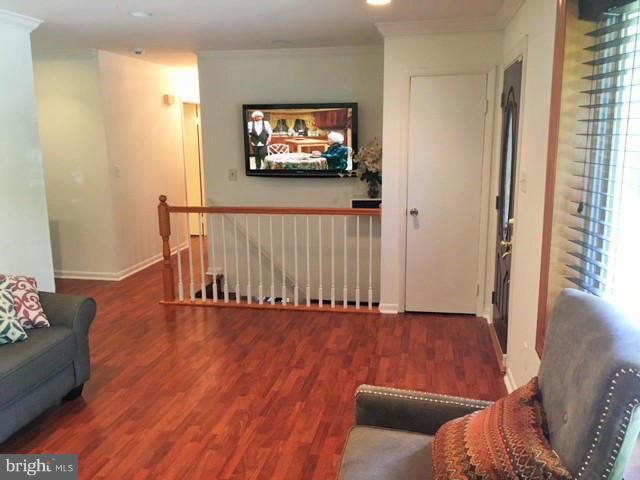 8506 Schultz Road Clinton, MD 20735 - Photo 5 of 30 a living room with furniture and a flat screen tv