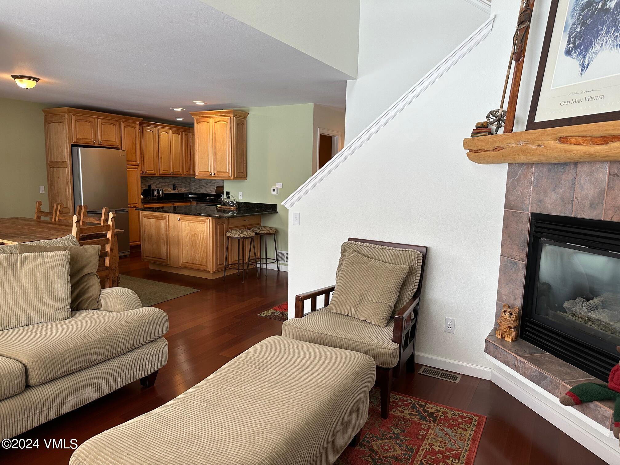 8 Red Tail Drive Edwards, CO 81632 - Photo 4 of 9 a living room with furniture and a fireplace