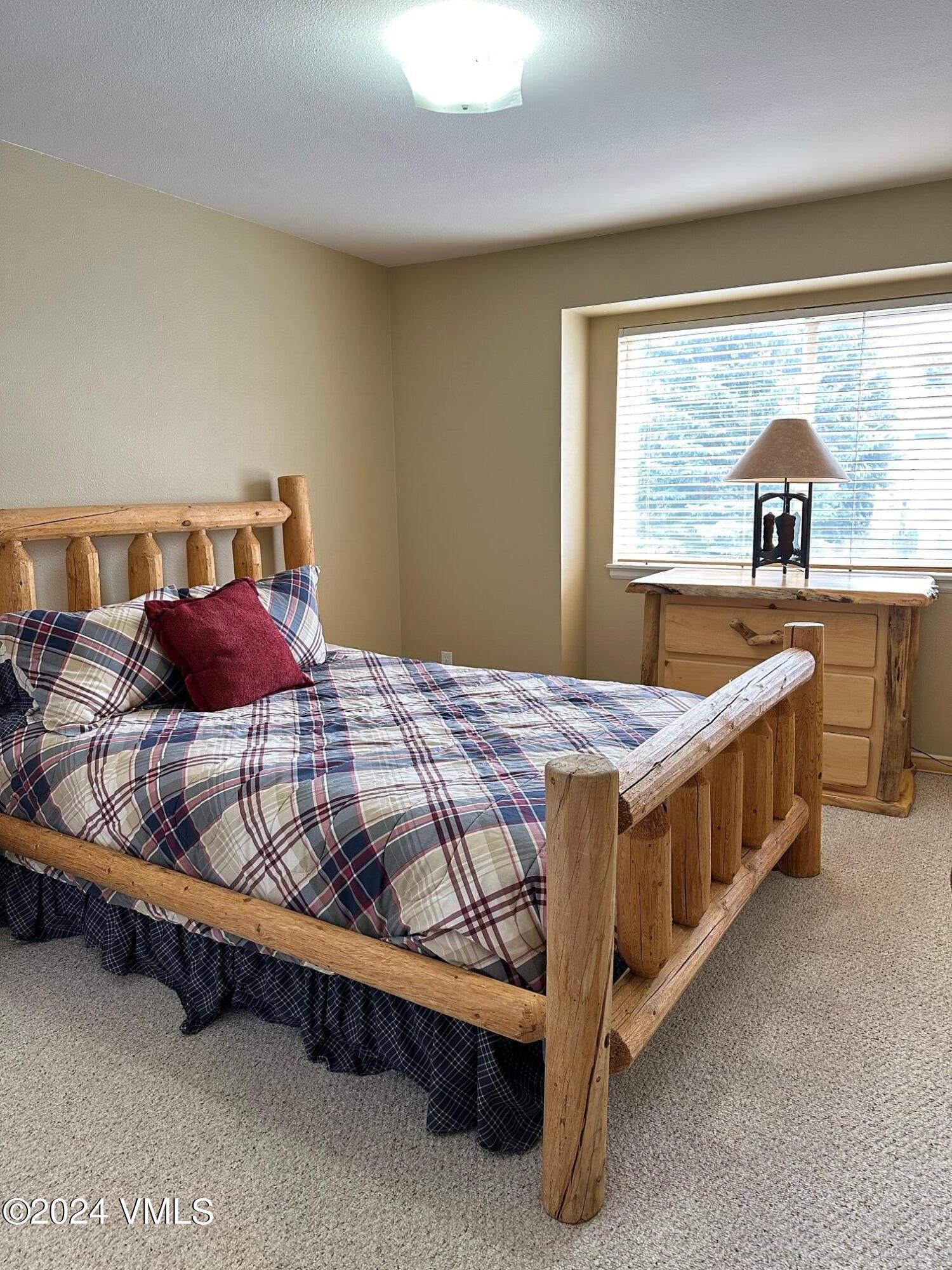 8 Red Tail Drive Edwards, CO 81632 - Photo 8 of 9 a bedroom with a bed and window