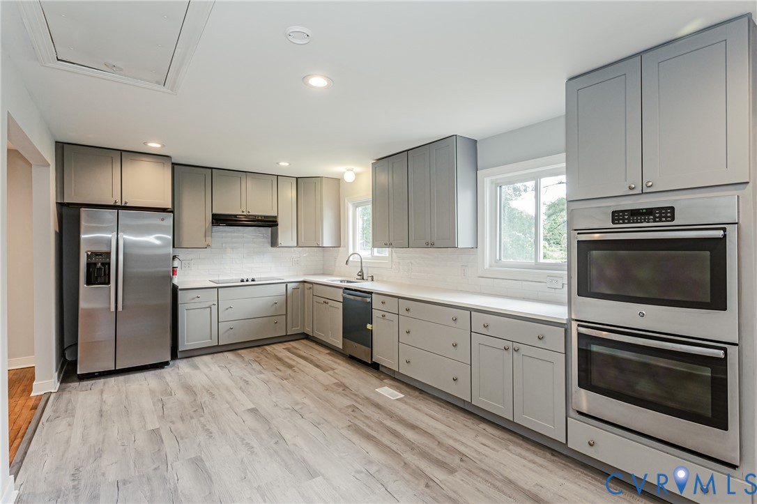 2015 Fordson Road Richmond, VA 23229 - Photo 10 of 48 Modern kitchen featuring light gray cabinetry, sta