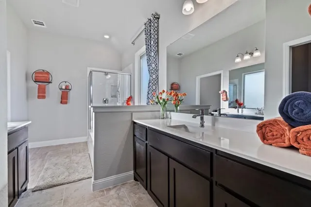 a bedroom with a bed and furniture