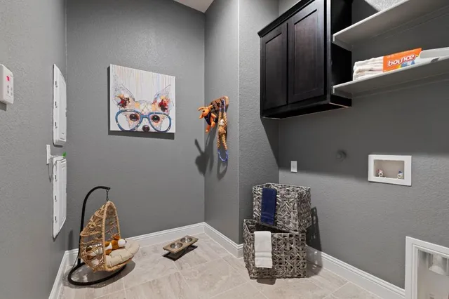 a bathroom with a tub and shower