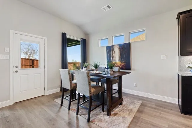 a kitchen with lots of counter top space and appliances