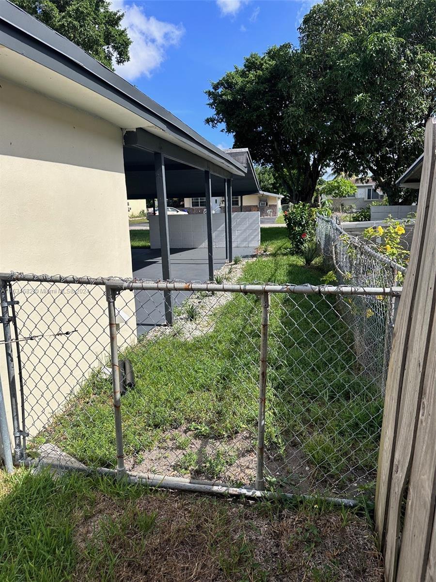 6517 Wiley Street Hollywood, FL 33023 - Photo 13 of 17 a view of a backyard