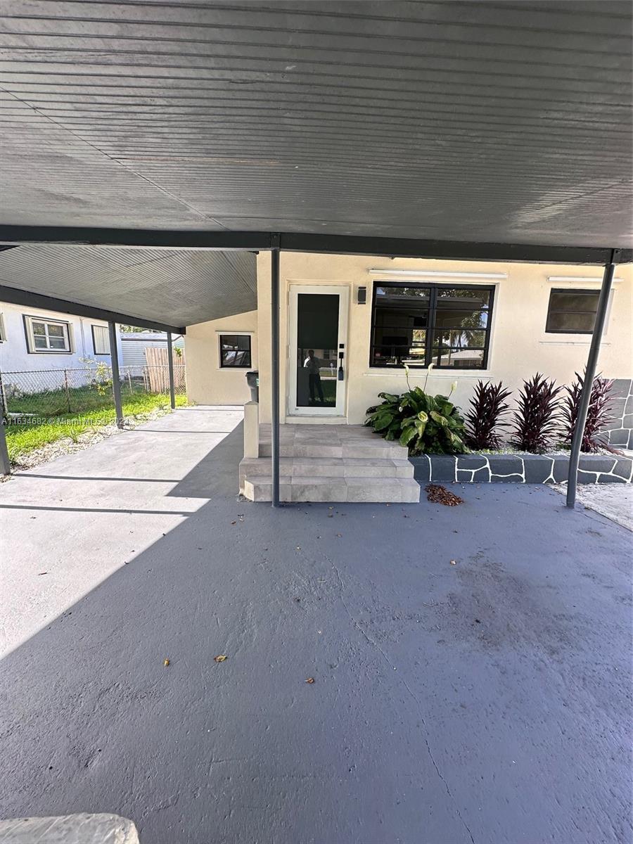 6517 Wiley Street Hollywood, FL 33023 - Photo 16 of 17 a view of a porch
