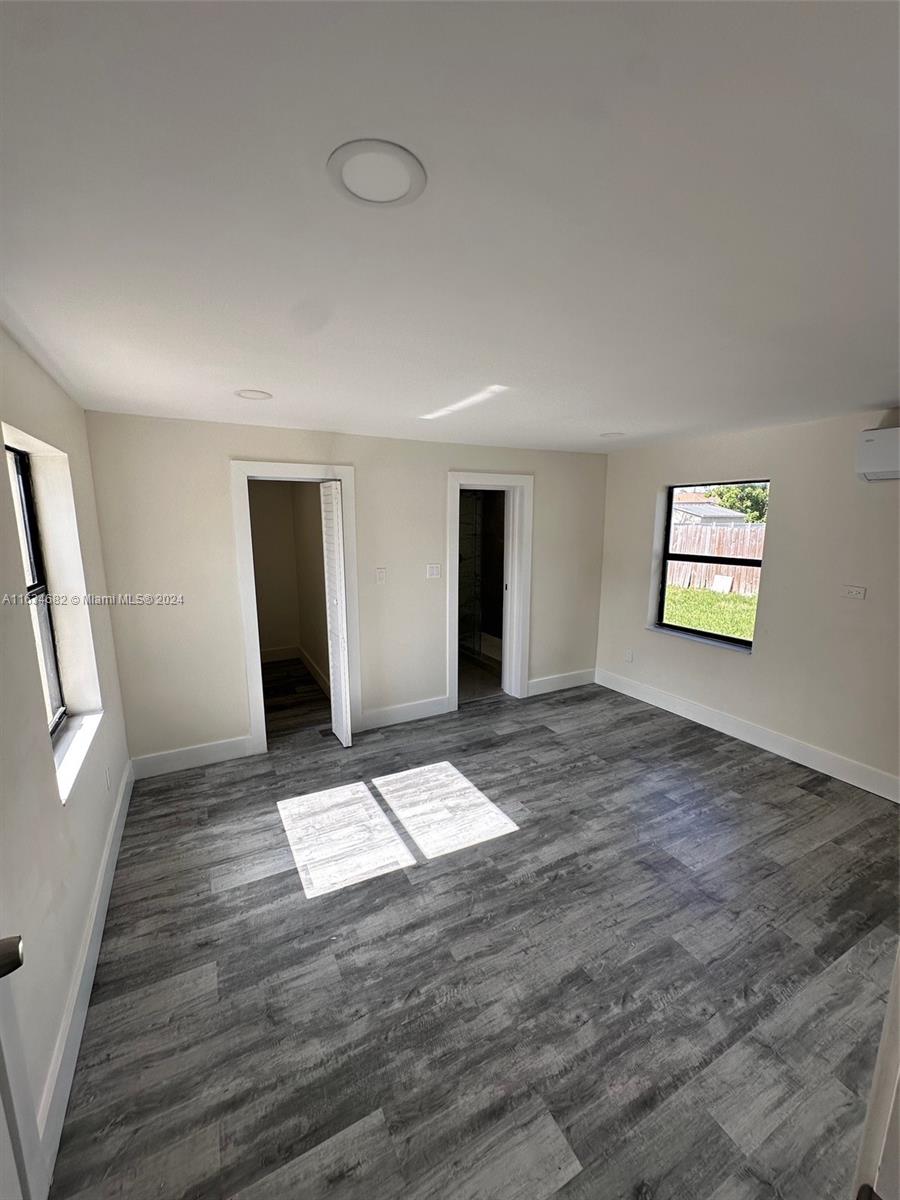 6517 Wiley Street Hollywood, FL 33023 - Photo 9 of 17 a view of an empty room and window