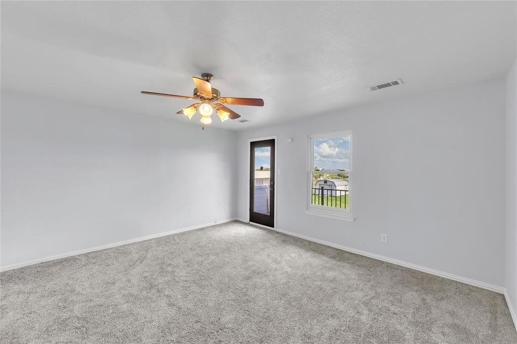 16055 Prairie Meadow Forney, TX 75126 - Photo 19 of 33 a view of an empty room with window