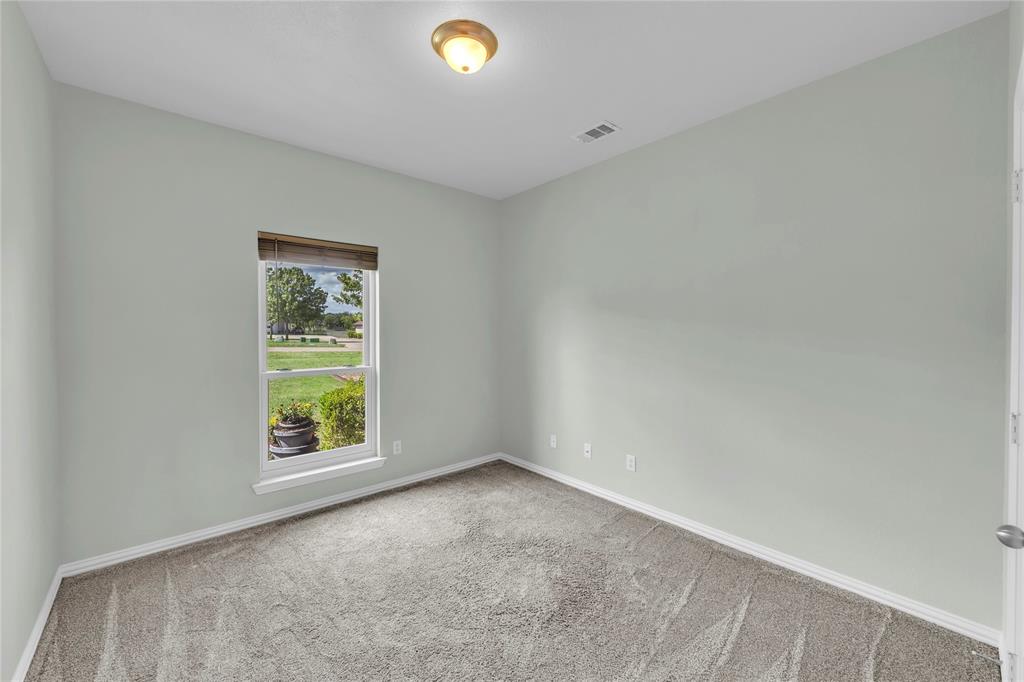 16055 Prairie Meadow Forney, TX 75126 - Photo 22 of 33 an empty room with windows