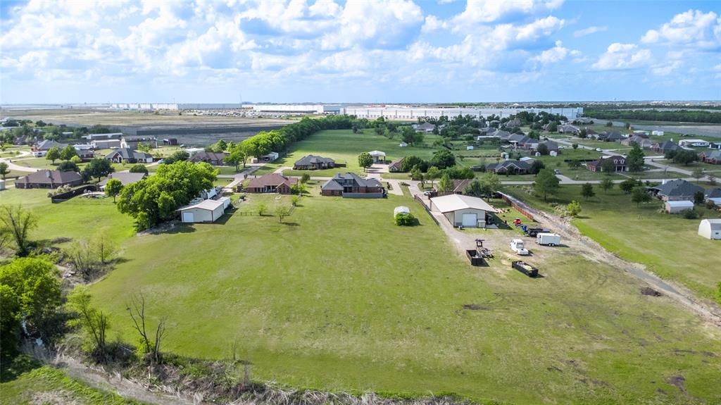 16055 Prairie Meadow Forney, TX 75126 - Photo 27 of 33 a view of a lake with a city