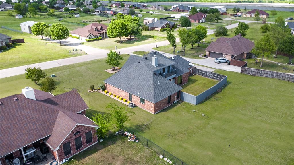 16055 Prairie Meadow Forney, TX 75126 - Photo 28 of 33 an aerial view of a house with yard swimming pool and outdoor seating