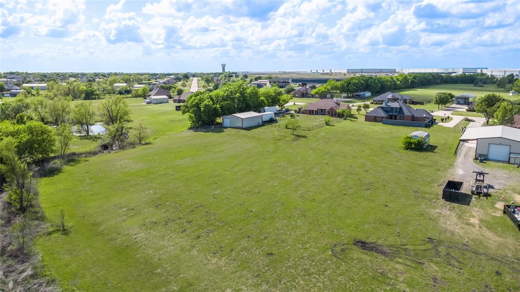 16055 Prairie Meadow Forney, TX 75126 - Photo 29 of 33 a view of a garden with houses