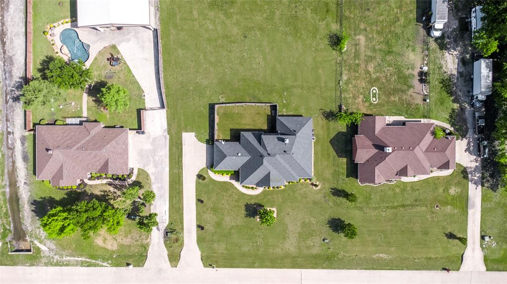 16055 Prairie Meadow Forney, TX 75126 - Photo 32 of 33 an aerial view of a house with outdoor space