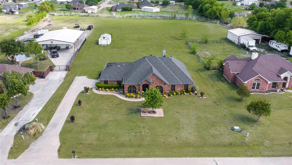 16055 Prairie Meadow Forney, TX 75126 - Photo 33 of 33 an aerial view of a house with yard swimming pool and outdoor seating