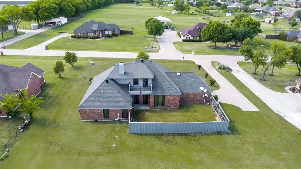 16055 Prairie Meadow Forney, TX 75126 - Photo 5 of 33 an aerial view of a house with yard swimming pool and outdoor seating