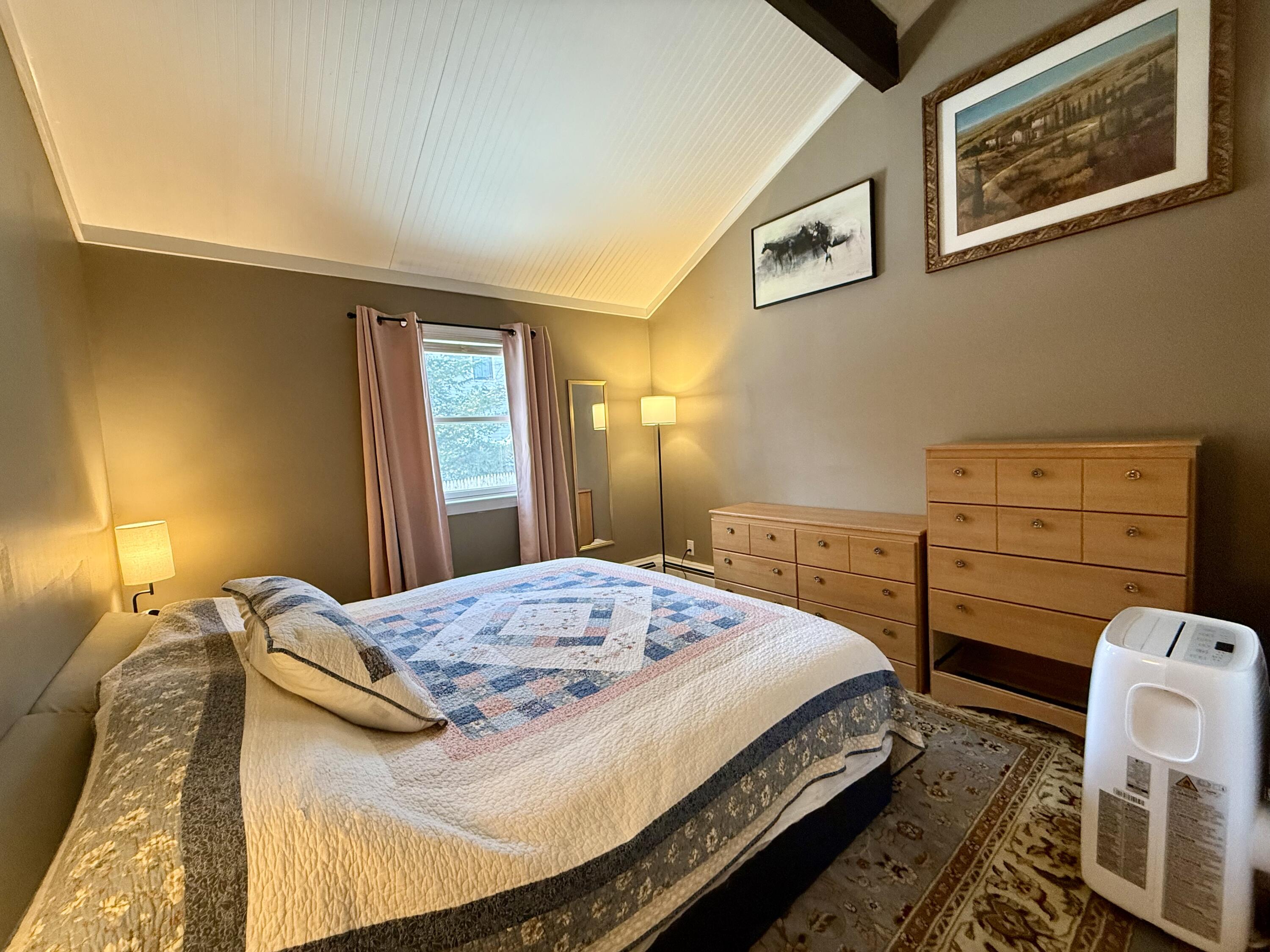 60 Ashumet Avenue Mashpee, MA 02649 - Photo 14 of 30 a bedroom with a bed and a dresser