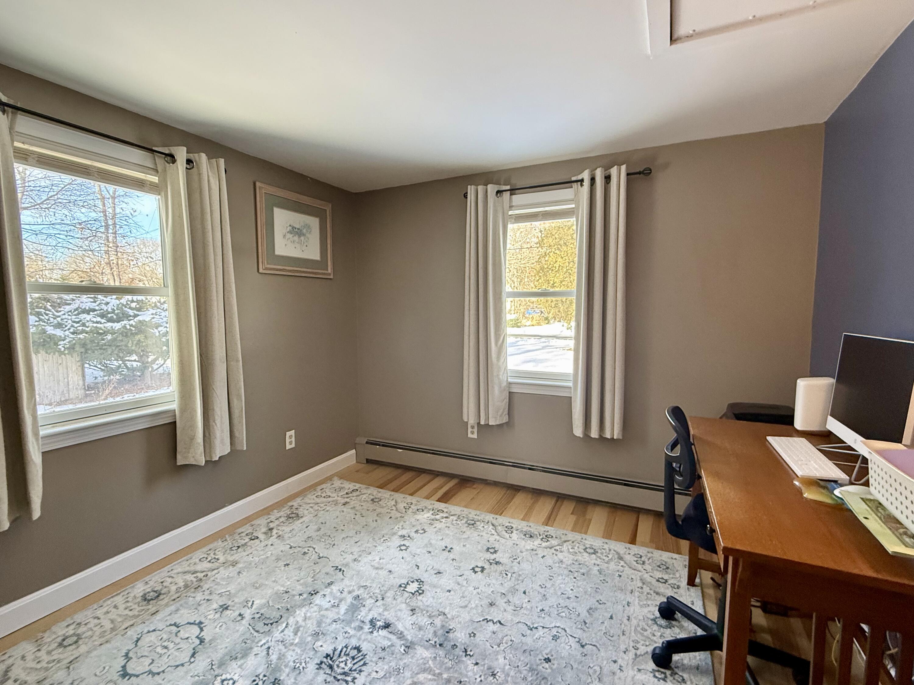 60 Ashumet Avenue Mashpee, MA 02649 - Photo 21 of 30 a view of a workspace with furniture and a window