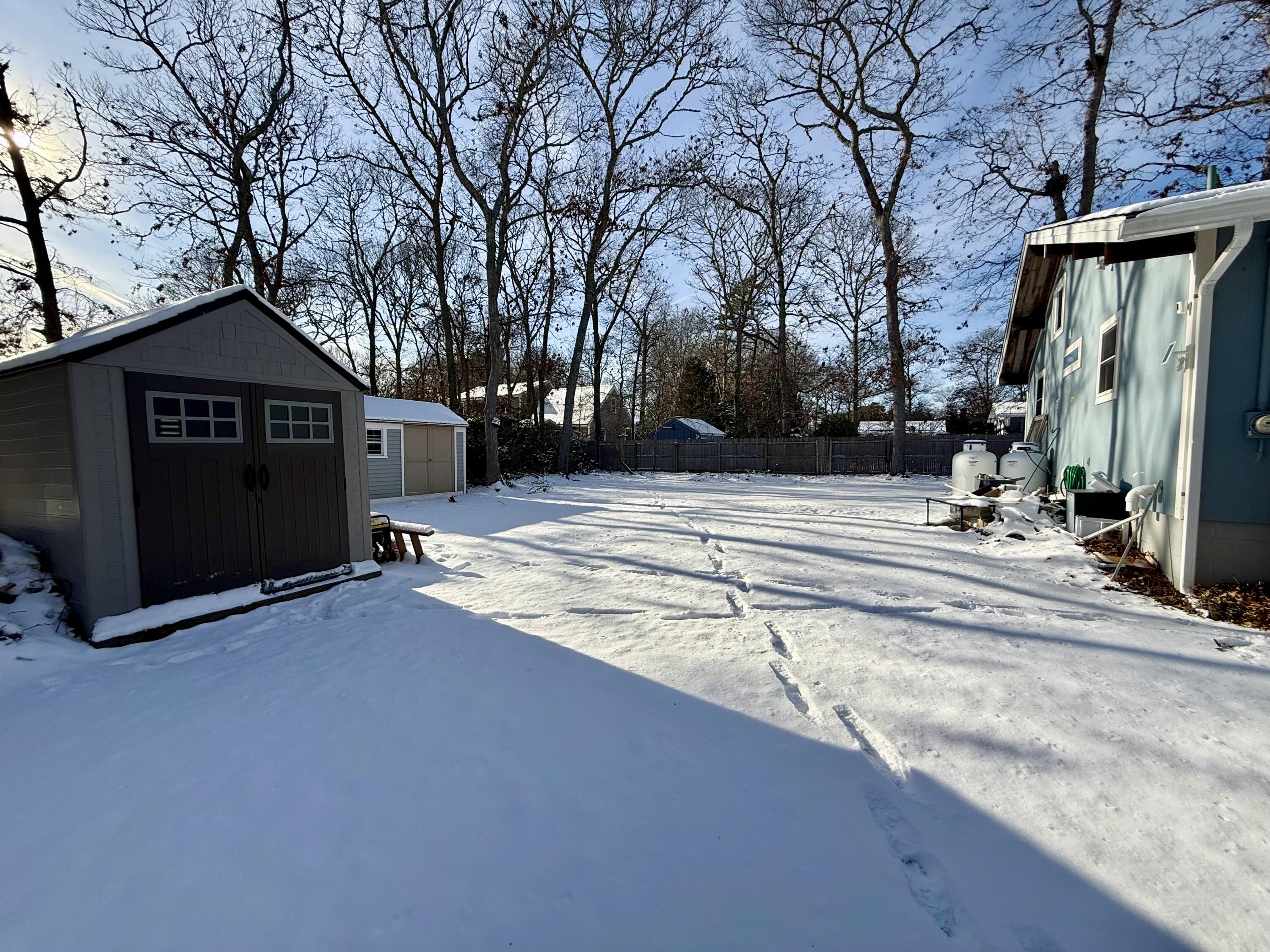60 Ashumet Avenue Mashpee, MA 02649 - Photo 4 of 30 a view of a house with a yard