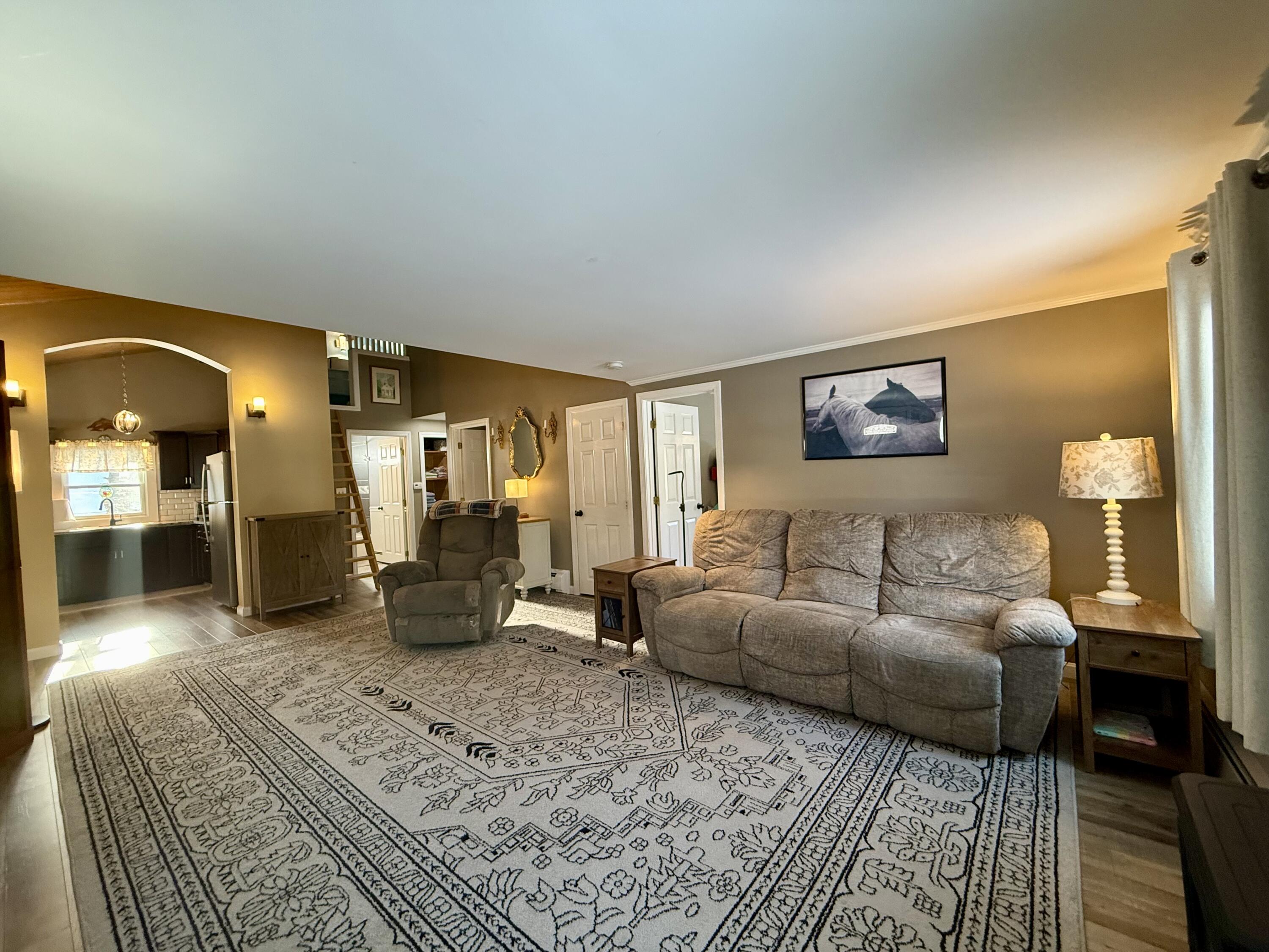 60 Ashumet Avenue Mashpee, MA 02649 - Photo 7 of 30 a living room with furniture and a couch