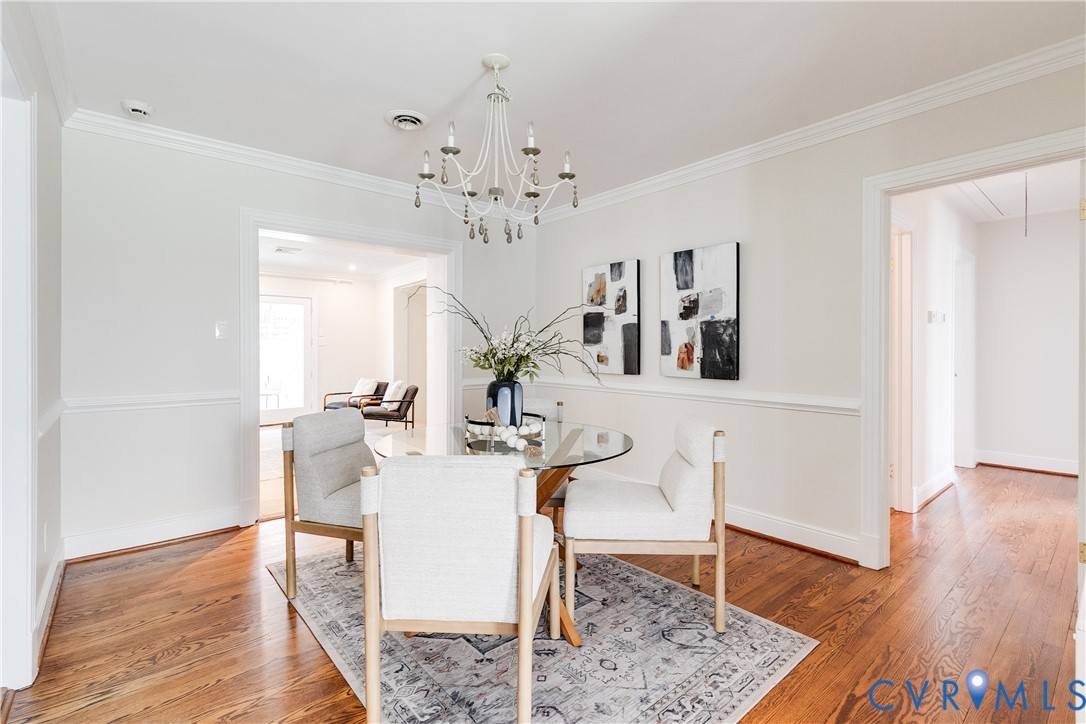 609 Baldwin Road Henrico, VA 23229 - Photo 14 of 50 a view of a dining room with furniture and wooden floor
