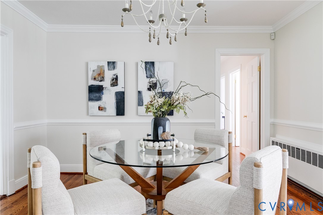 609 Baldwin Road Henrico, VA 23229 - Photo 16 of 50 a dining room with furniture and chandelier