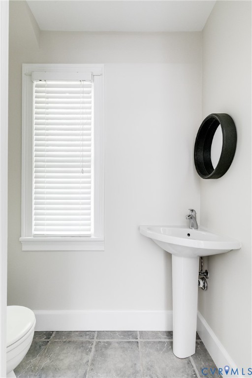 609 Baldwin Road Henrico, VA 23229 - Photo 23 of 50 a bathroom with a sink and a toilet