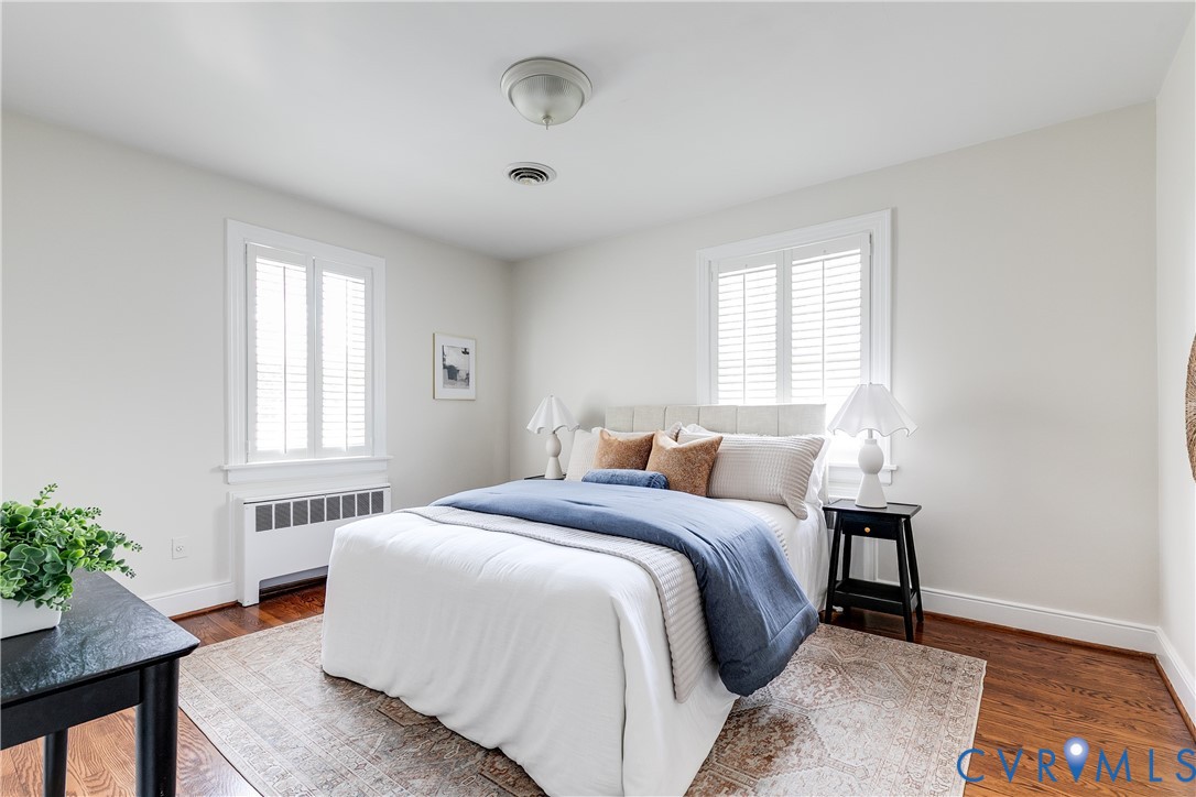 609 Baldwin Road Henrico, VA 23229 - Photo 32 of 50 a bedroom with a bed and a potted plant