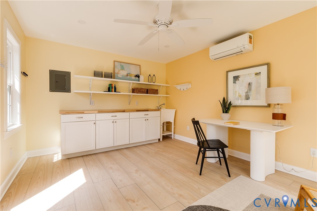 609 Baldwin Road Henrico, VA 23229 - Photo 44 of 50 a living room with stainless steel appliances kitchen island granite countertop furniture and a kitchen view