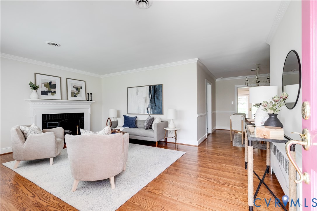 609 Baldwin Road Henrico, VA 23229 - Photo 5 of 50 a living room with furniture and a fireplace