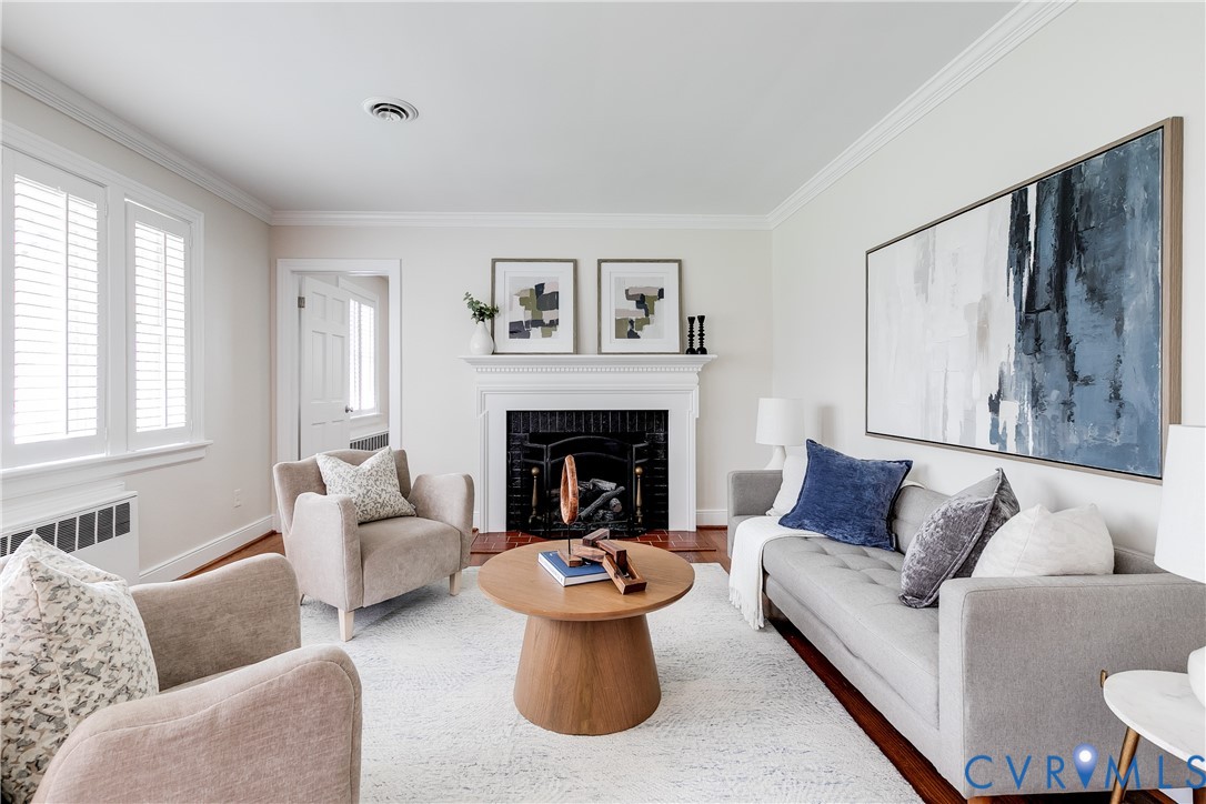 609 Baldwin Road Henrico, VA 23229 - Photo 6 of 50 a living room with furniture and a fireplace