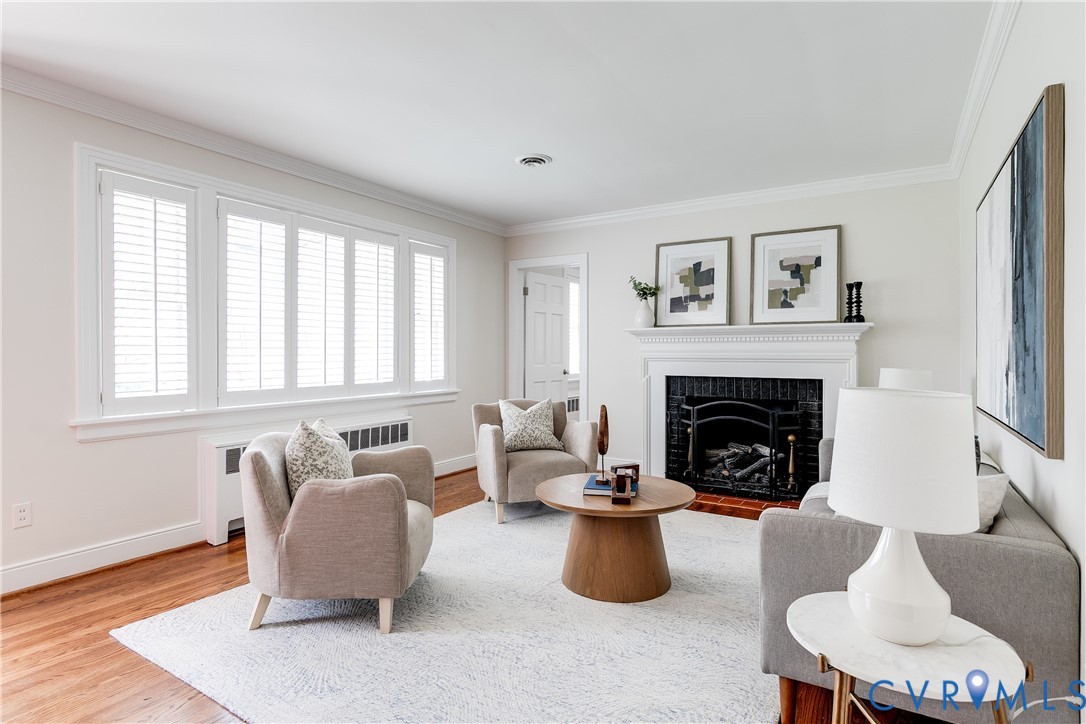 609 Baldwin Road Henrico, VA 23229 - Photo 7 of 50 a living room with furniture and a fireplace
