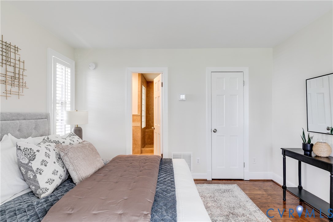 609 Baldwin Road Henrico, VA 23229 - Photo 10 of 50 a bedroom with a bed and a window