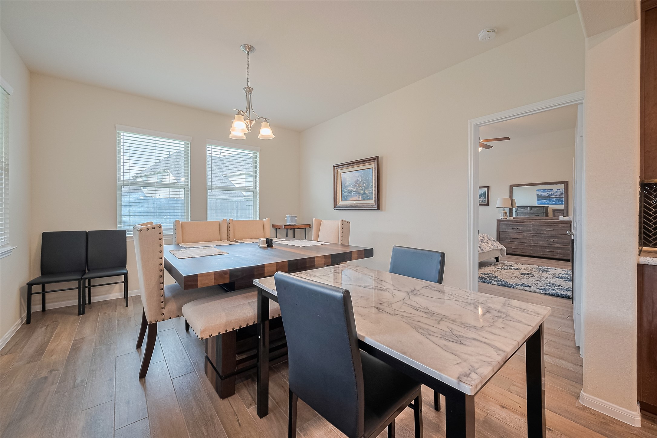 5802 Ashland Lane Pasadena, TX 77505 - Photo 20 of 50 a view of a dining room with furniture window and wooden floor