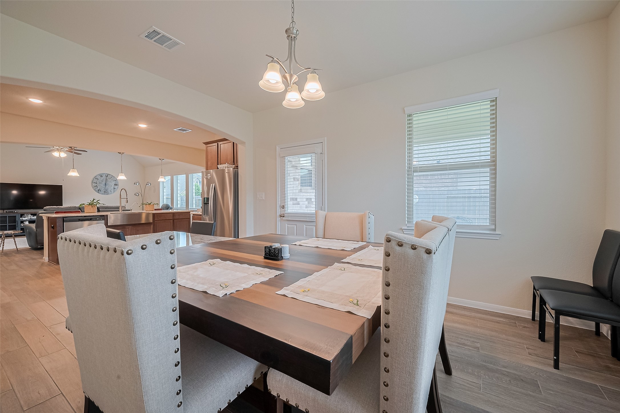 5802 Ashland Lane Pasadena, TX 77505 - Photo 22 of 50 a view of a dining room with furniture and wooden floor