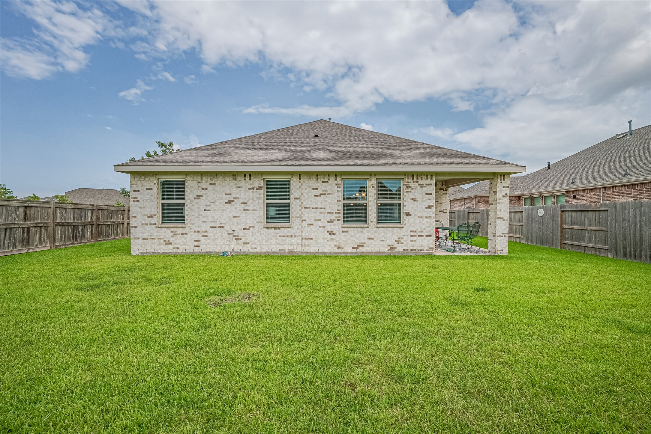 5802 Ashland Lane Pasadena, TX 77505 - Photo 43 of 50 a front view of a house with a garden