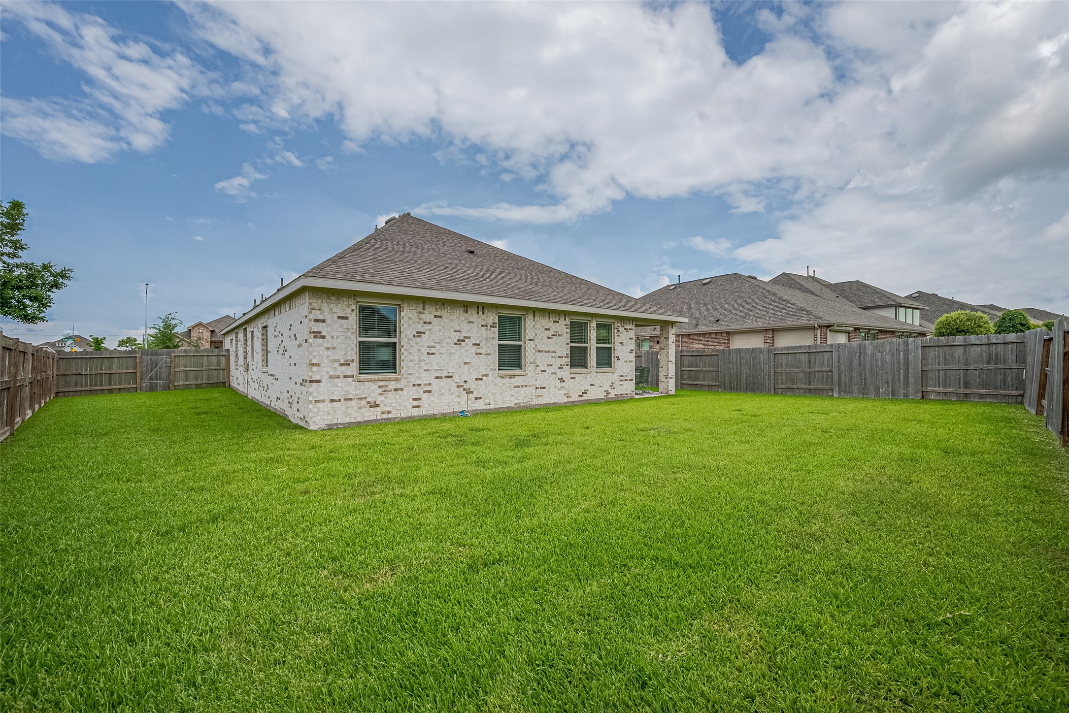 5802 Ashland Lane Pasadena, TX 77505 - Photo 46 of 50 a view of a house with a backyard
