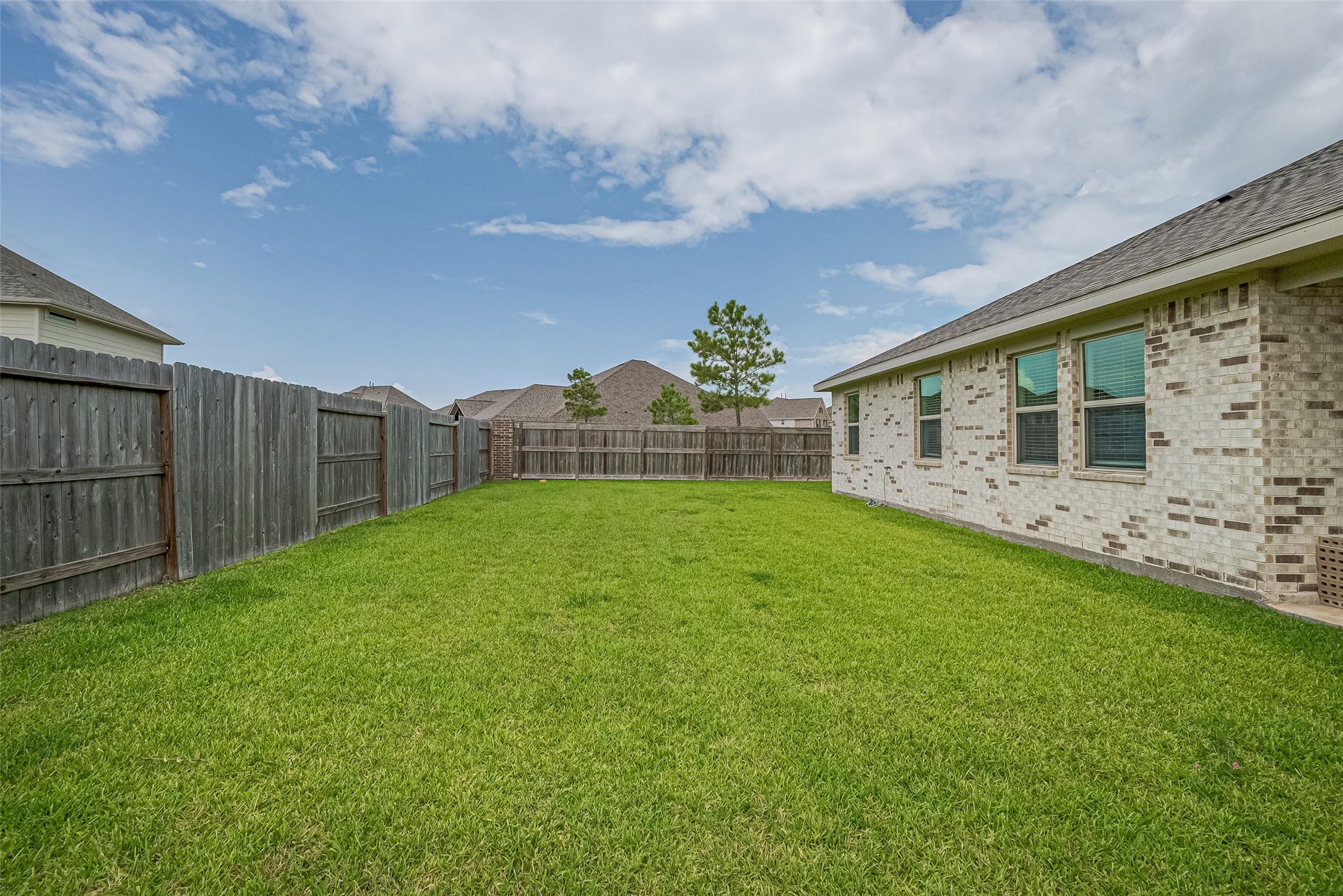 5802 Ashland Lane Pasadena, TX 77505 - Photo 47 of 50 a view of a backyard