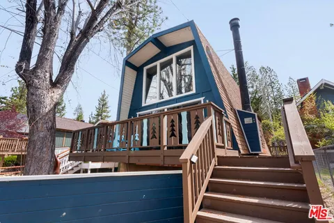 a view of outdoor space with deck and kitchen view