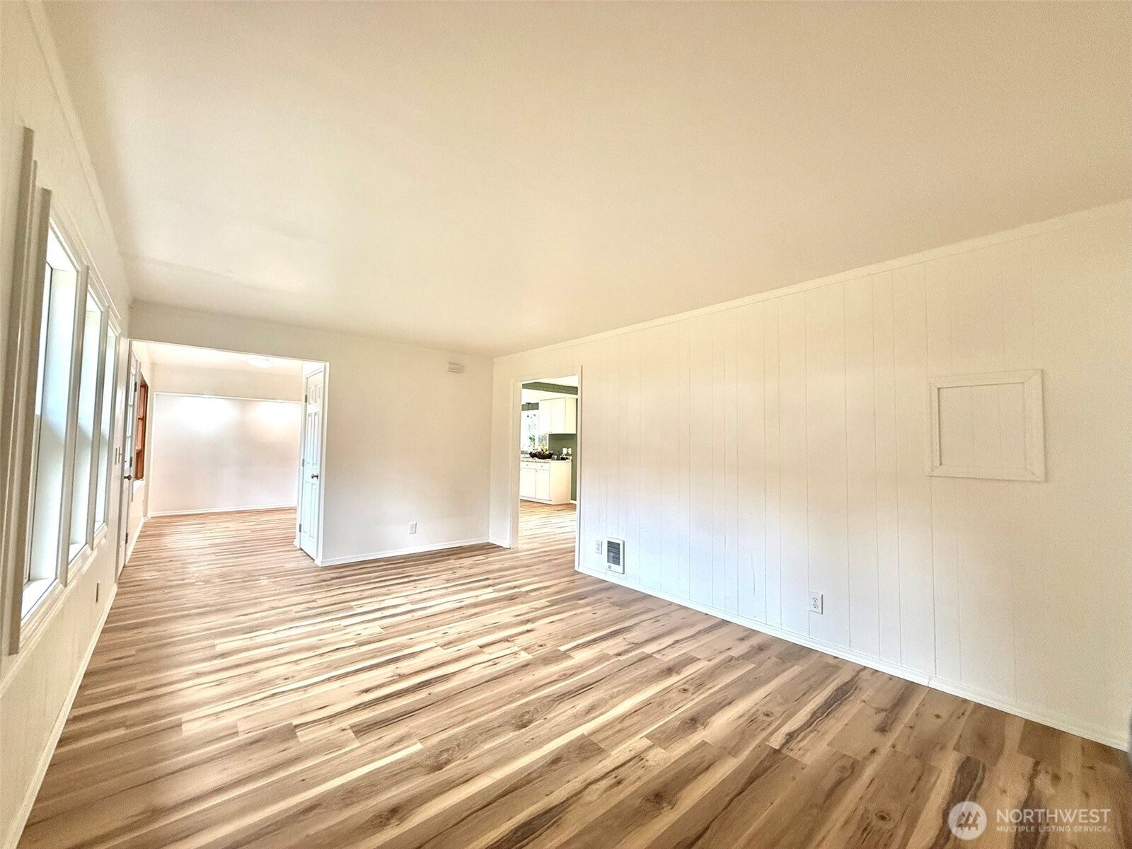22513 South Forest Loop Road Granite Falls, WA 98252 - Photo 11 of 39 a view of a room with wooden floor and a hallway