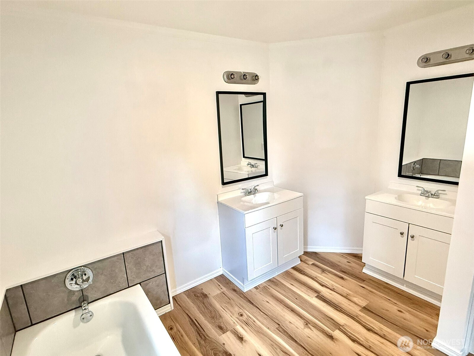 22513 South Forest Loop Road Granite Falls, WA 98252 - Photo 22 of 39 a bedroom with a bed and a flat tv screen on the dresser