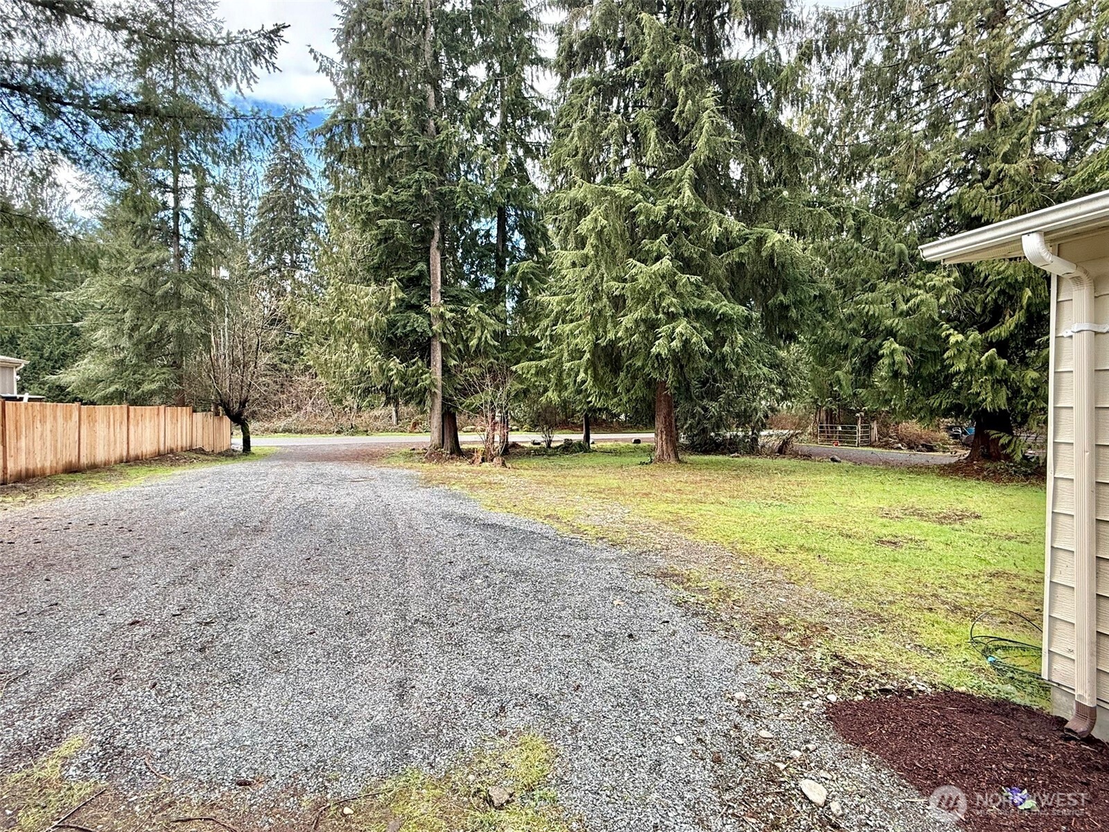 22513 South Forest Loop Road Granite Falls, WA 98252 - Photo 5 of 39 a view of outdoor space with deck and trees