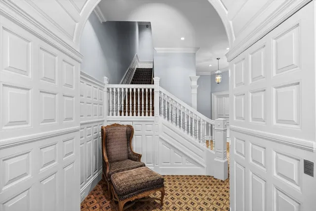 a view of entryway with wooden floor