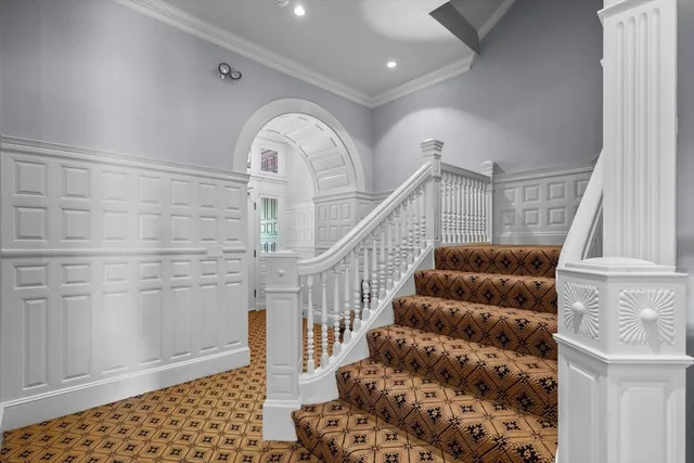 a view of entryway with wooden floor