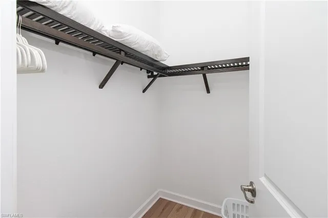 a view of a room with rack on the wall