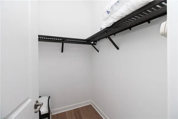 a view of a room with rack on the wall