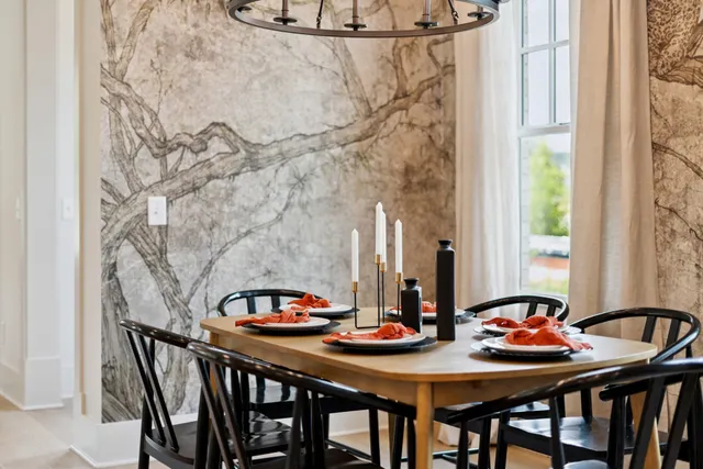 a kitchen with cabinets and window