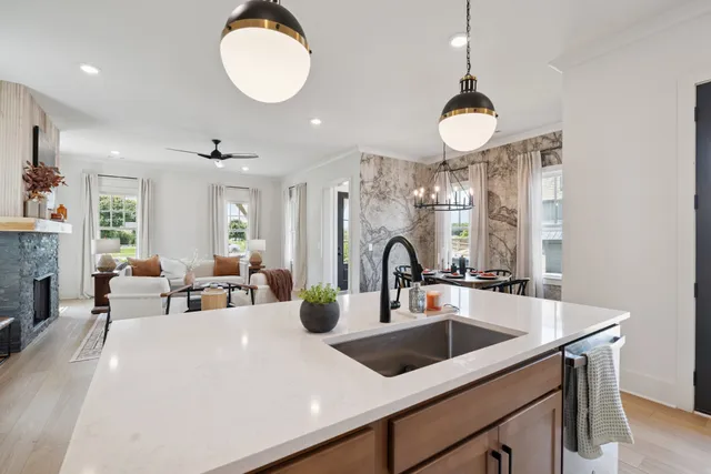 a bathroom with double vanity sinks and a mirror
