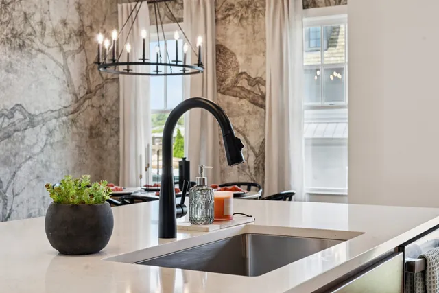 a bathroom with a double vanity sink a and a mirror
